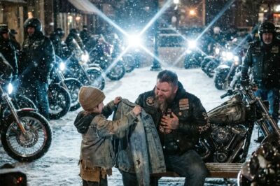 A nine-year-old homeless orphan gave her only coat to a Hell’s Angel collapsing from a heart attack. Minutes later, ninety hardened bikers filled the dark plaza, forcing the entire town to witness what real family looks like when high society turns away.