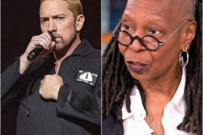 “YOU CAN’T SILENCE THE SPIRIT”: Eminem’s Explosive Clash With Whoopi Goldberg on The View Leaves Studio Frozen — The Mic-Cut Moment That Allegedly Sent Shockwaves Across Television!What began as a tense exchange reportedly spiraled into a moment no one in the studio could control. As voices rose and the atmosphere turned electric, Eminem stunned the room with a fiery response that brought the conversation to a standstill. When Whoopi Goldberg demanded, “Somebody cut his mic!” — viewers say the damage was already done.