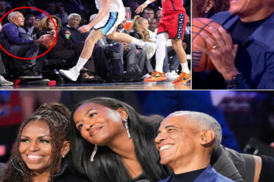 Earlier in the night, a loose ball suddenly flew toward their seats — and Obama reacted instantly, cleanly snagging it to the crowd’s delight before tossing it back to Devin Booker of the Phoenix Suns. He smiled and exchanged a few words with Booker as the arena erupted.