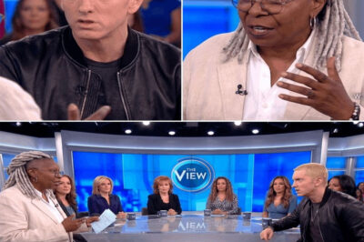 “YOU CAN’T SILENCE THE SPIRIT”: Eminem’s Explosive Clash With Whoopi Goldberg on The View Leaves Studio Frozen — The Mic-Cut Moment That Allegedly Sent Shockwaves Across Television!What began as a tense exchange reportedly spiraled into a moment no one in the studio could control. As voices rose and the atmosphere turned electric, Eminem stunned the room with a fiery response that brought the conversation to a standstill. When Whoopi Goldberg demanded, “Somebody cut his mic!” — viewers say the damage was already done.